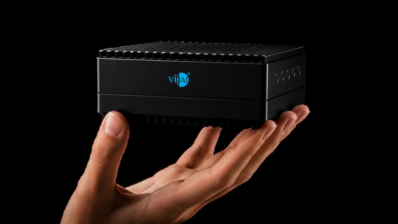 The VijAI edge device resting on an open palm